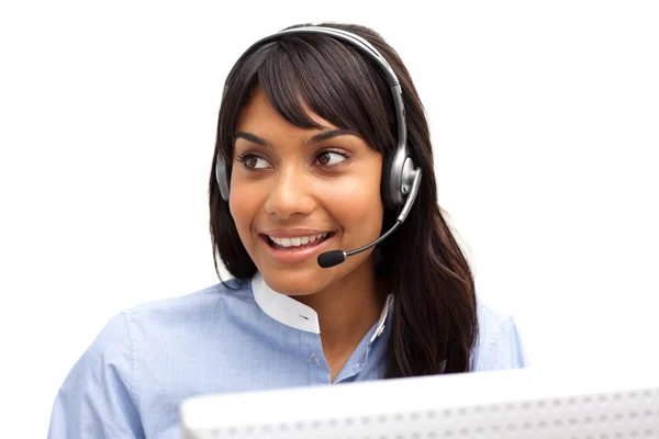 Ethnic businesswoman with headset on — Stock Photo, Image