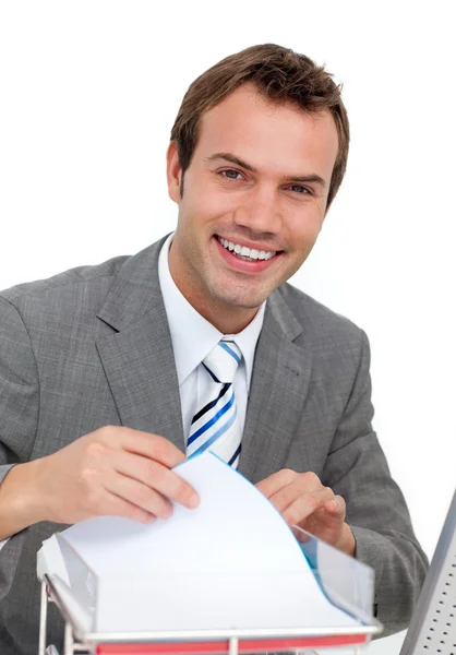 Confident young businessman studying a contract — Stock Photo, Image