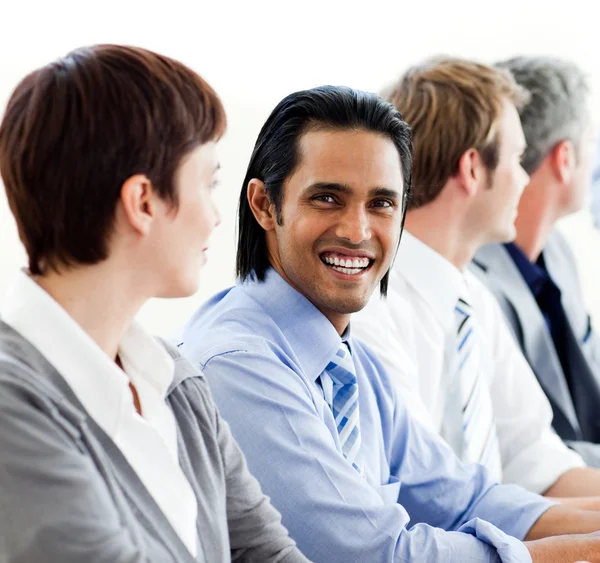 International business sitting in a row — Stock Photo, Image