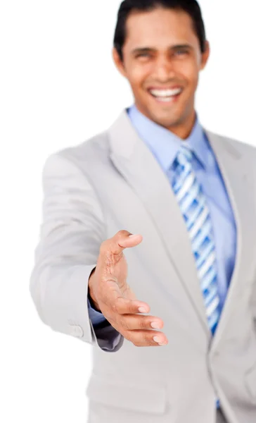 Confident businessman reaching out to shake hands — Stock Photo, Image