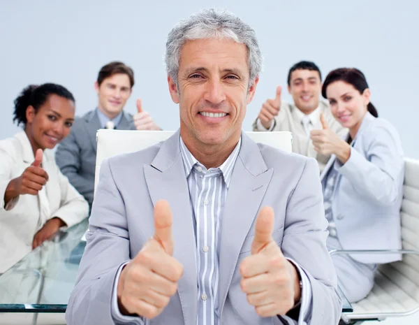 Mature manager celebrating a sucess with his team — Stock Photo, Image