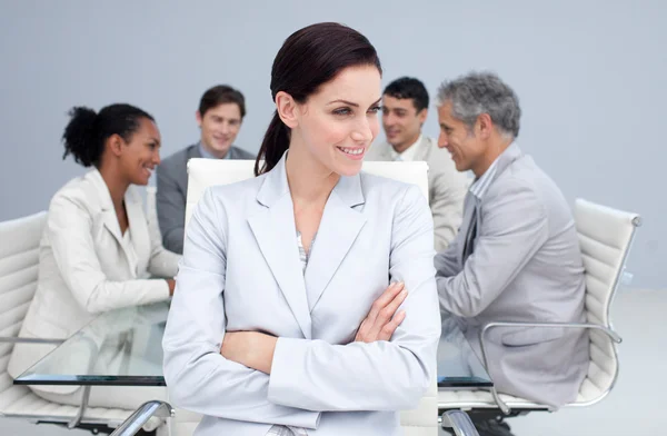 Beautiful businesswoman smiling in a meeting — Stock Photo, Image