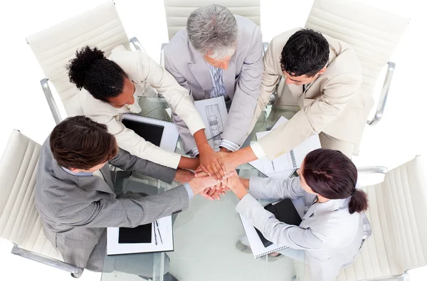 Cheerful international business with hands together — Stock Photo, Image