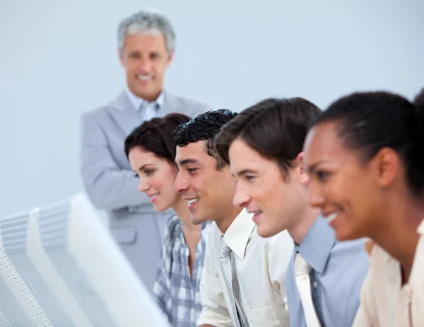 Positive business with their senior manager — Stock Photo, Image