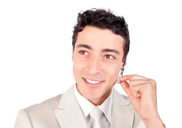 Pozitivní etnické podnikatel s sluchátka na — Stock fotografie