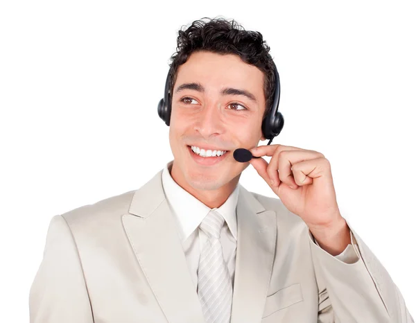 Etnische jonge zakenman met hoofdtelefoon op — Stockfoto