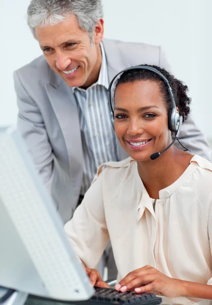 Charming mature manager checking his employee's work — Stock Photo, Image