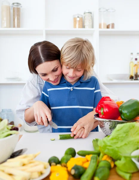 Happy mother and her son cooking — Stock Photo, Image