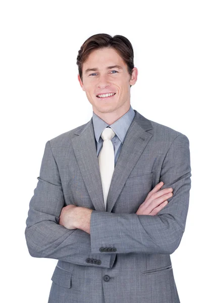 Self-assured businessman standing with folded arms — Stock Photo, Image