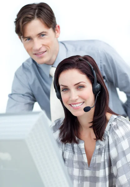 Brunette businesswoman helping by her manager — Stock Photo, Image