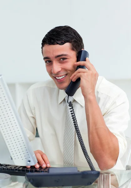 Positive businessman talking on phone — Stock Photo, Image