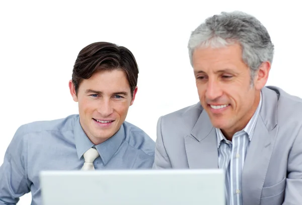 Concentrated business co-workers using a laptop — Stock Photo, Image