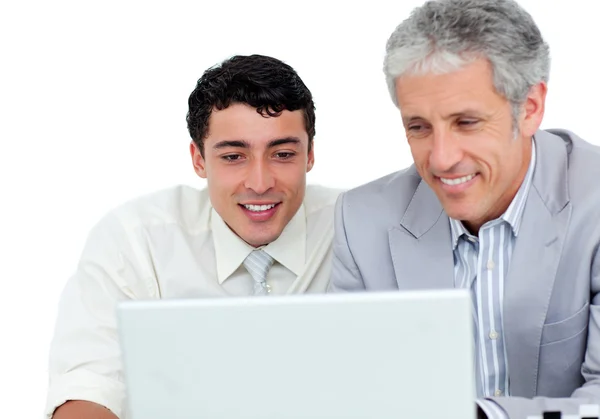Assertive business co-workers using a laptop — Stock Photo, Image