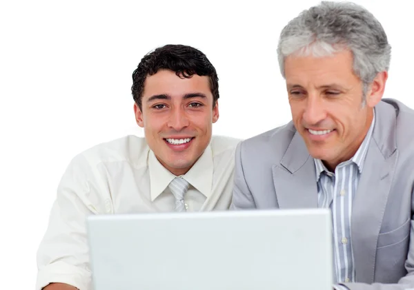 Charming business co-workers using a laptop — Stock Photo, Image