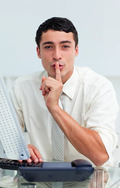 Young businessman asking for silence — Stock Photo, Image