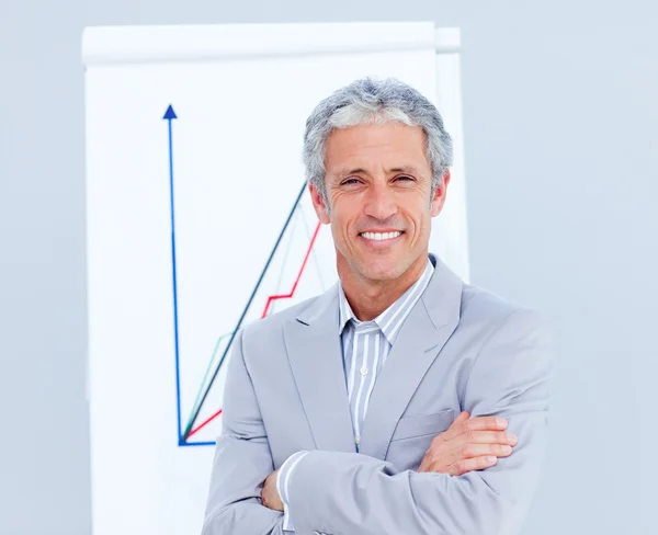 Smiling businessman giving a presentation — Stock Photo, Image