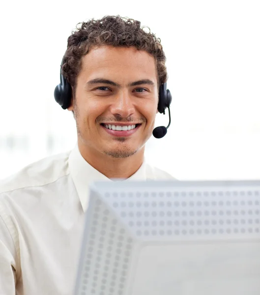 Latin young businessman with headset on — Stock Photo, Image