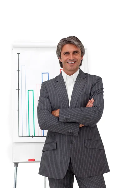 Charismatic mature businessman with folded arms — Stock Photo, Image