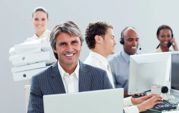 Presentation of an ambitious business team working hard — Stock Photo, Image