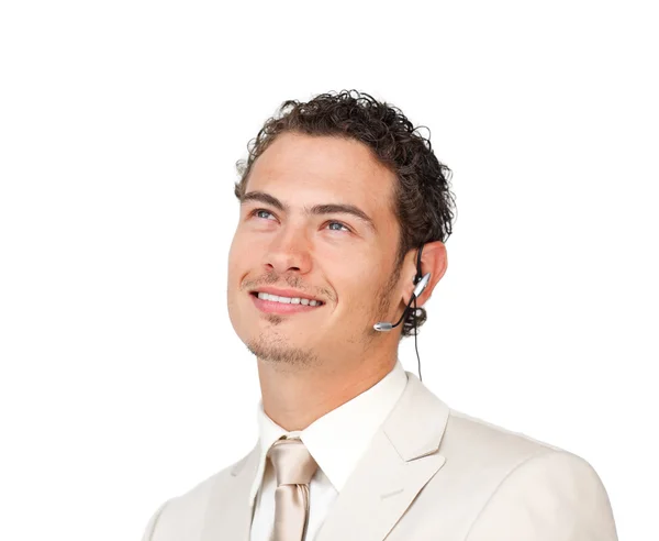 Young businessman with headset on looking up — Stock Photo, Image