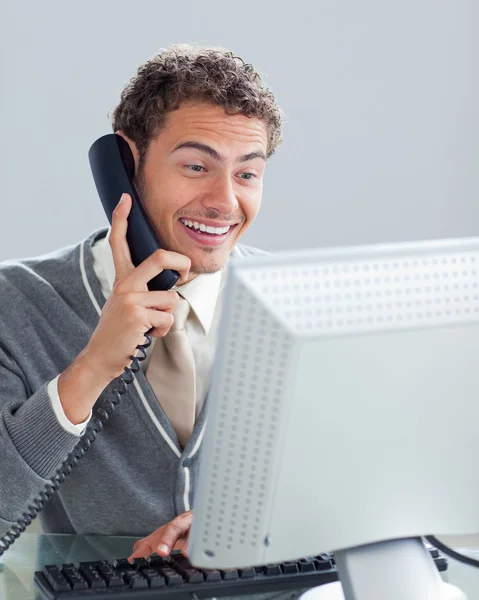 Charming businessman on phone at his desk — Stock Photo, Image