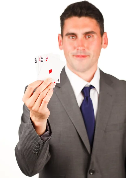 Üzletember, amely bemutatja a négy ász póker kártya — Stock Fotó