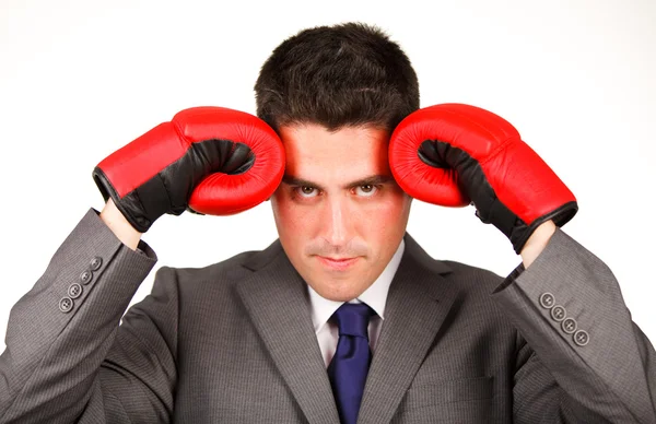 Стрессовый бизнесмен в боксёрских перчатках — стоковое фото