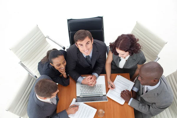 Businessteam working together with a laptop — Stock Photo, Image