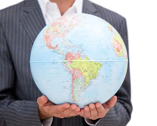 Close-up van een mannelijke uitvoerend bedrijf een terrestrische globe — Stockfoto