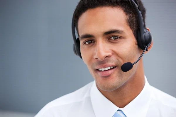 Portrait of a handsome customer service agent at work — Stock Photo, Image