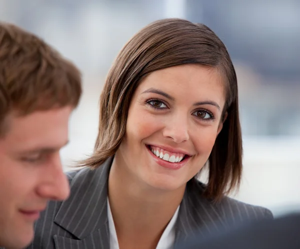 Portrait of a jolly businesswoman and her colleague — Stock Photo, Image
