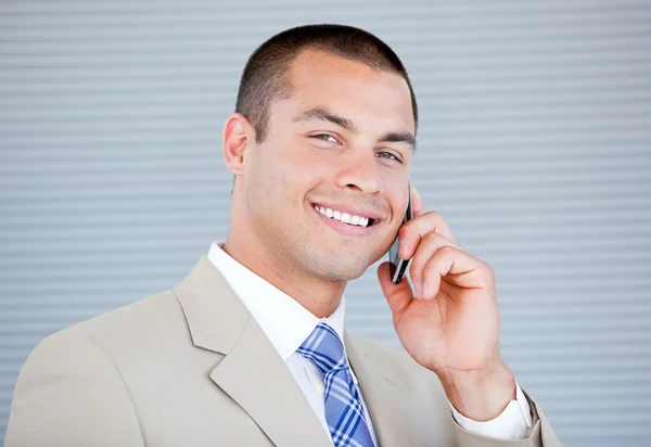 Assertive businessman talking on phone — Stock Photo, Image