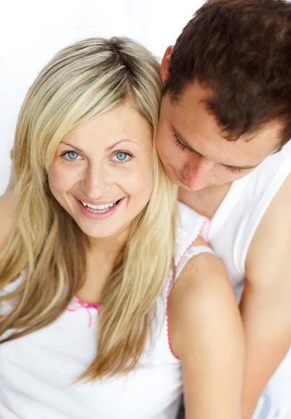 Smiling woman sitting with her boyfriend — Stock Photo, Image