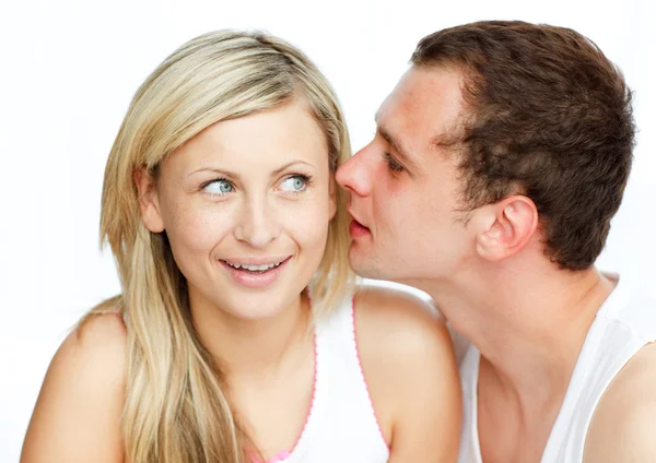 Man whispering a woman something important — Stock Photo, Image
