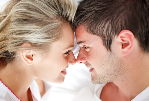 Close-up of smiling couple looking at each other — Stock Photo, Image