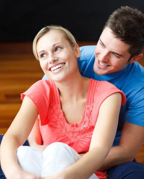 Lovers sitting in their new house — Stock Photo, Image