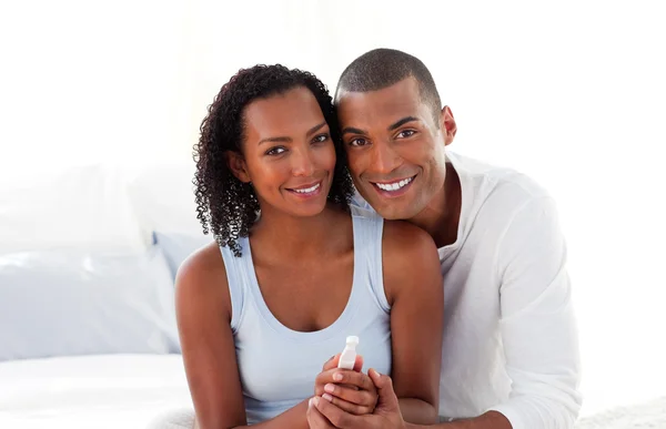 Jolly couple finding out results of a pregnancy test — Stock Photo, Image