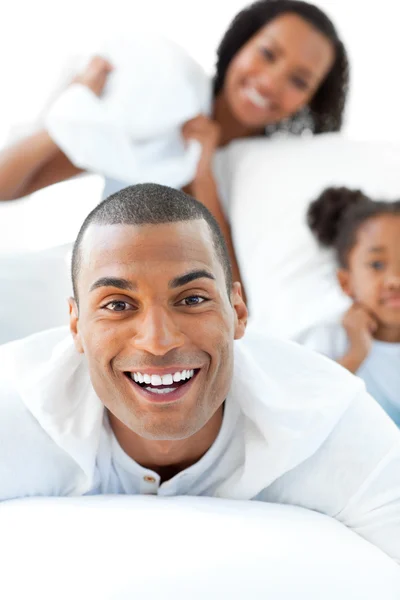Attractive man having fun with his wife and his daughter — Stock Photo, Image
