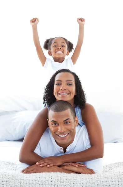 Adorable little girl having fun with her parents — Stock Photo, Image