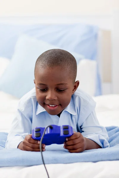 Little boy playing video game — Stock Photo, Image