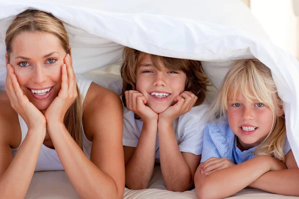 Attractive mother having fun with her children — Stock Photo, Image
