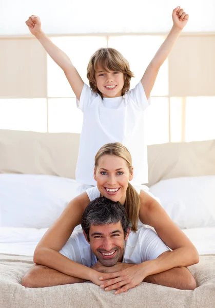 Happy boy playing with his parents — Stock Photo, Image