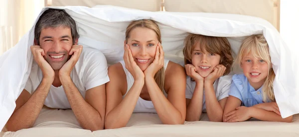 Portrait of a attentive parents with their children — Stock Photo, Image