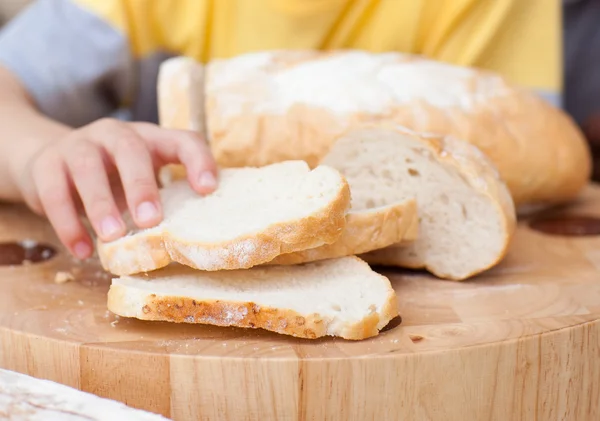 stock image Close-up of child taking some bread