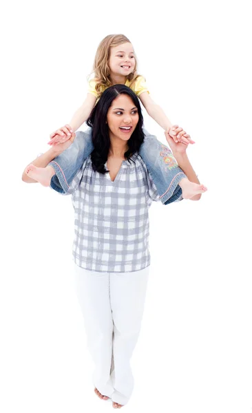 Cheerful mother giving piggyback ride to her daughter — Stock Photo, Image