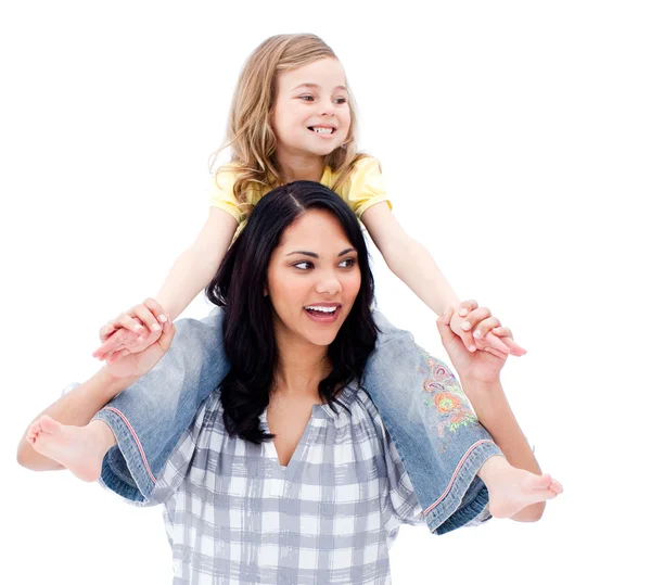 Smiling mother giving piggyback ride to her girl — Stock Photo, Image
