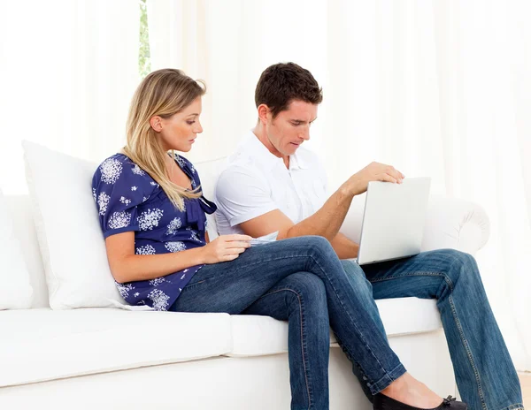 Upset couple stressed with so many bills to pay — Stock Photo, Image