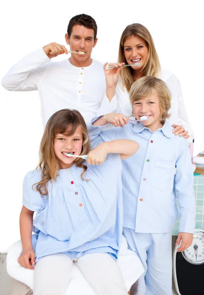 Jolly family brushing their teeth — Stock Photo, Image