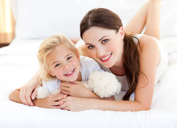 Portrait of a smiling mother and her little girl — Stock Photo, Image