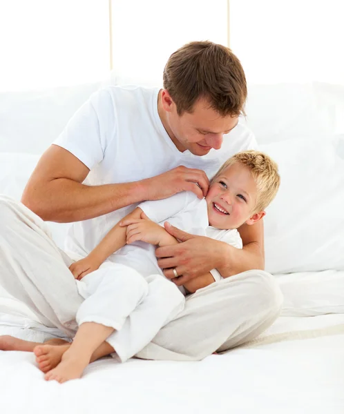Animated little boy having fun with his dad — Stock Photo, Image